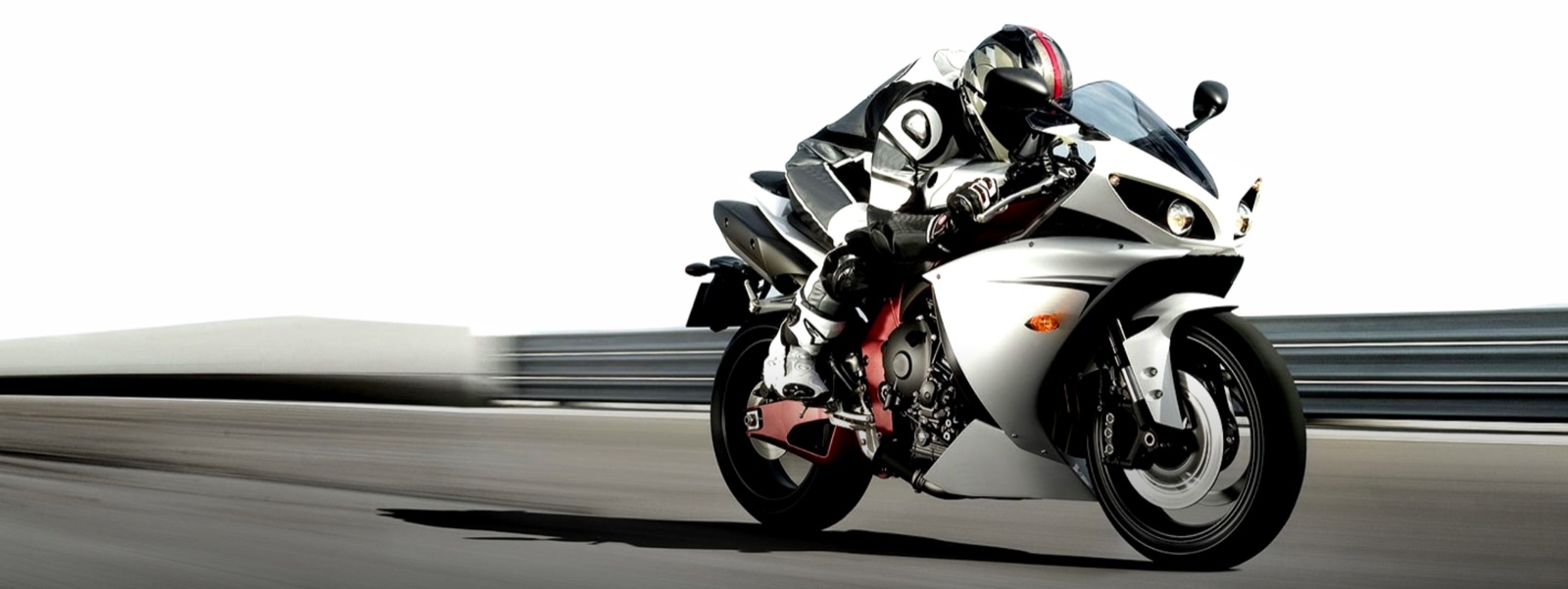 Motocicleta esportiva em pista, foto do catálogo Dulub